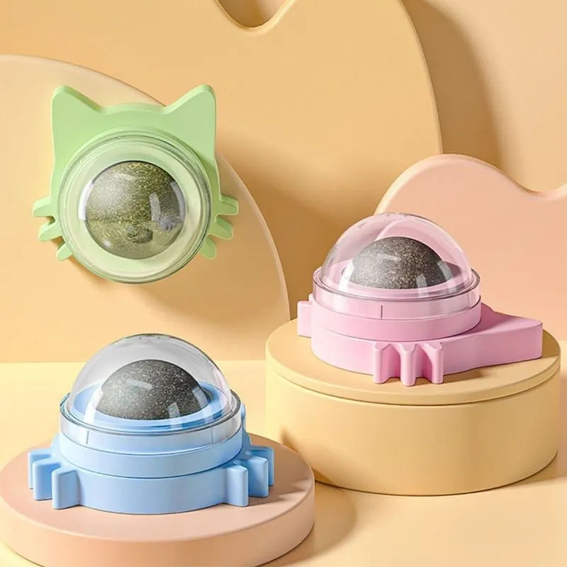 Catnip ball wall edible rotating toy in pink, orange, and blue colours, 5x5x4cm plastic mint
