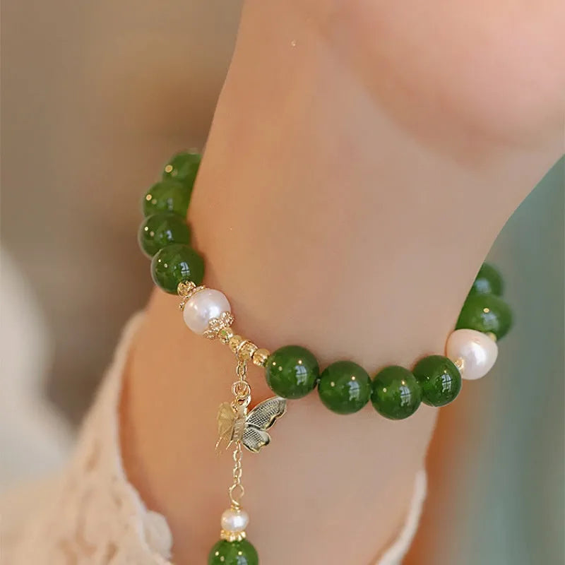 Green chalcedony bracelet with geometric design and round beads for women