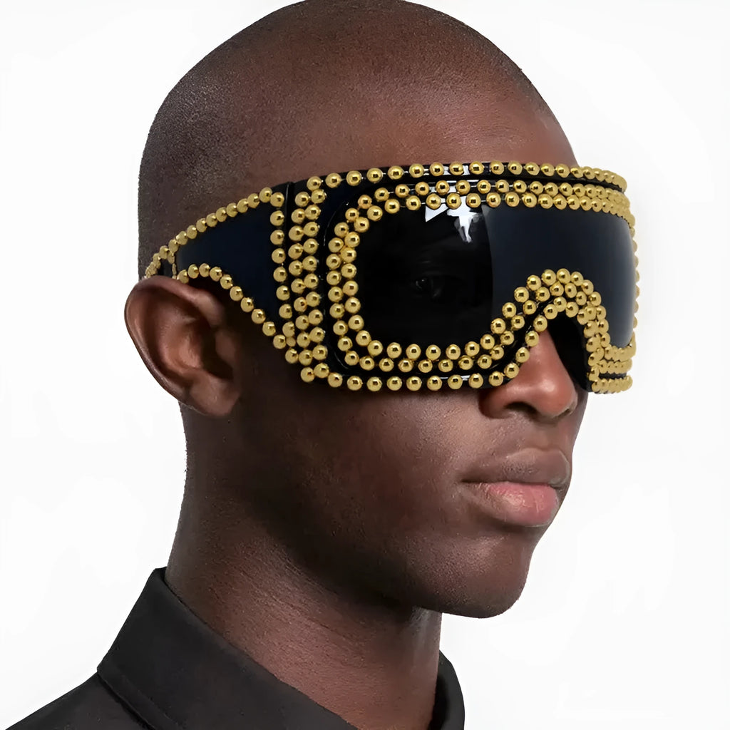 Men's silver square sunglasses with large rim, rivet details on arms, on a plain background.