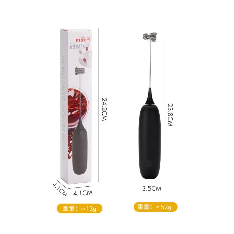 Handheld electric milk frother blender in black and white colour options on a kitchen counter.