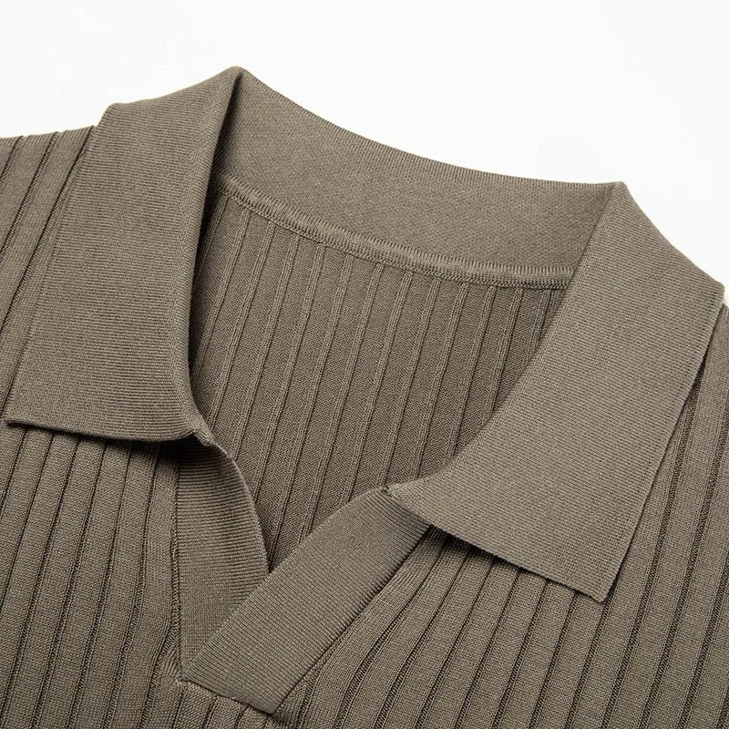Man wearing a striped mulberry silk T-shirt with a lapel neckline and short sleeves.