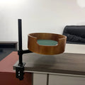 Round desktop suspended cat nest with stainless steel frame in light gray, placed on a wooden desk