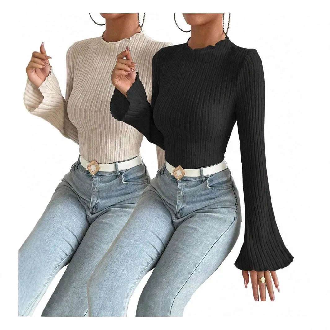 Long sleeve slim fit top with lantern sleeves in black brushed polyester fabric.