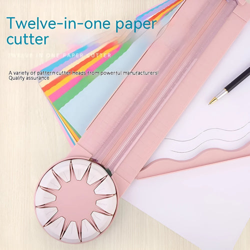 A pink plastic 12-in-1 multifunctional paper cutter with a dotted design on a flat surface.