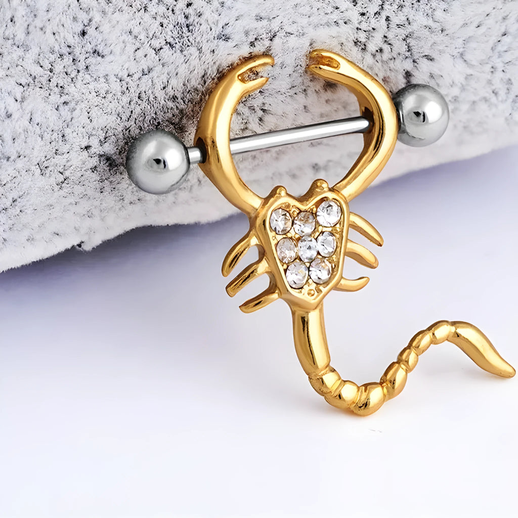 Gold scorpion belly ring with 316L medical steel bar and crystal diamond inlay on white background