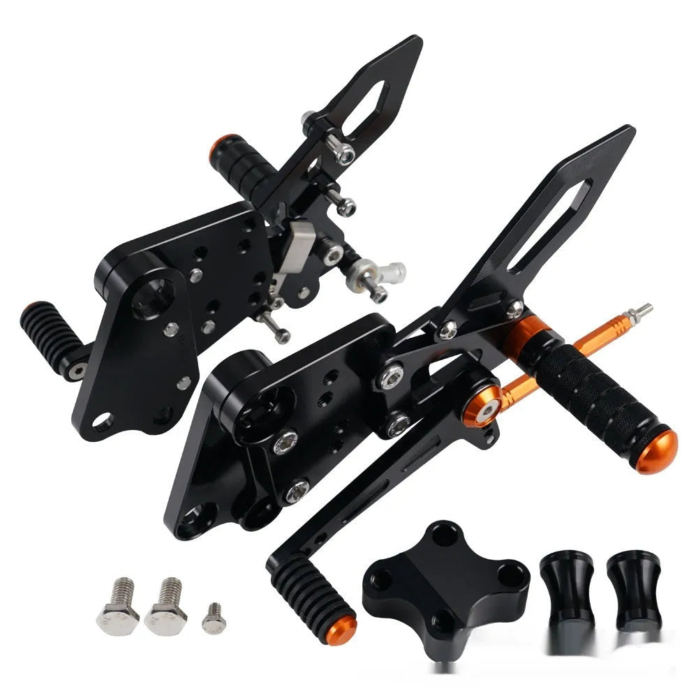 Black and orange KTM DUKE motorcycle footpeg bracket assembly for 125 200 250 390 models