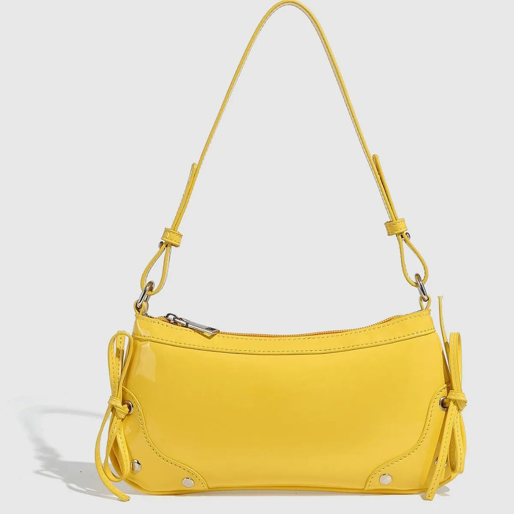 Solid colour PU underarm bag with double bow and rivet decoration, horizontal square shape