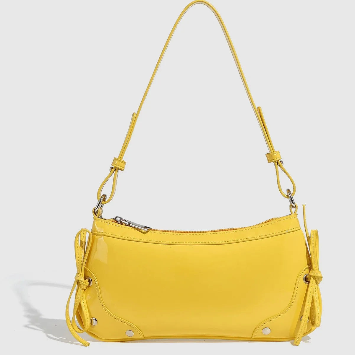 Solid colour PU underarm bag with double bow and rivet decoration, horizontal square shape