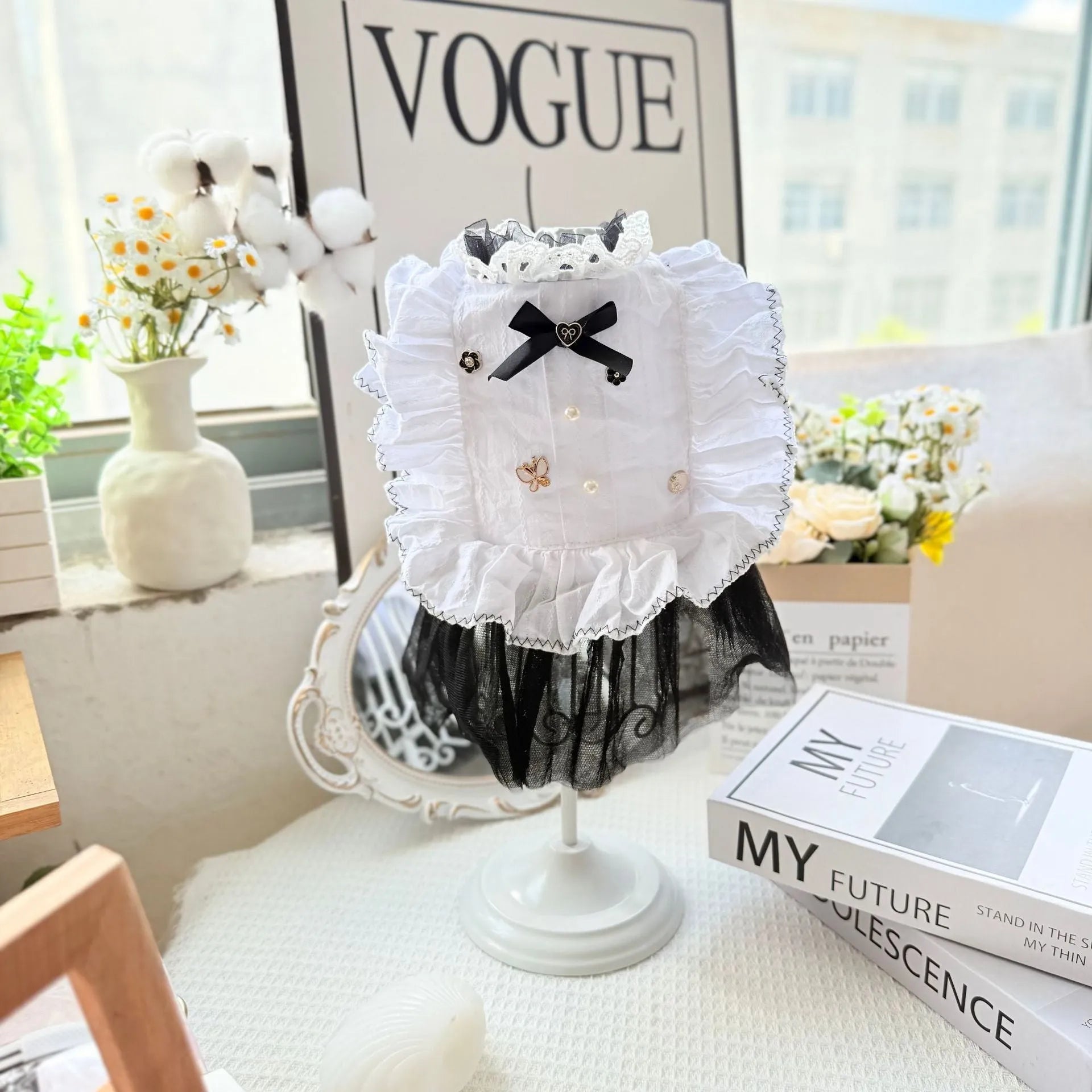 White princess-style dog dress with a gauze yarn skirt on a small dog, showing fit and style.