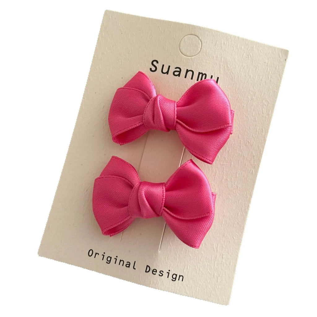 Fabric bowknot children's hair clip in cream colour with 6cm bow size on side clip