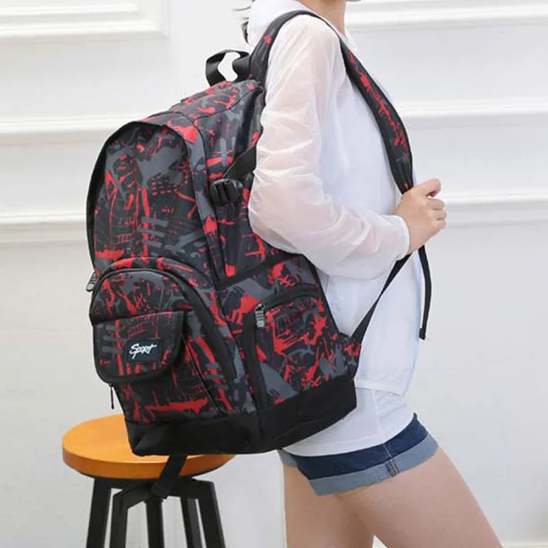Blue classic nylon backpack with large main compartment and adjustable shoulder straps.