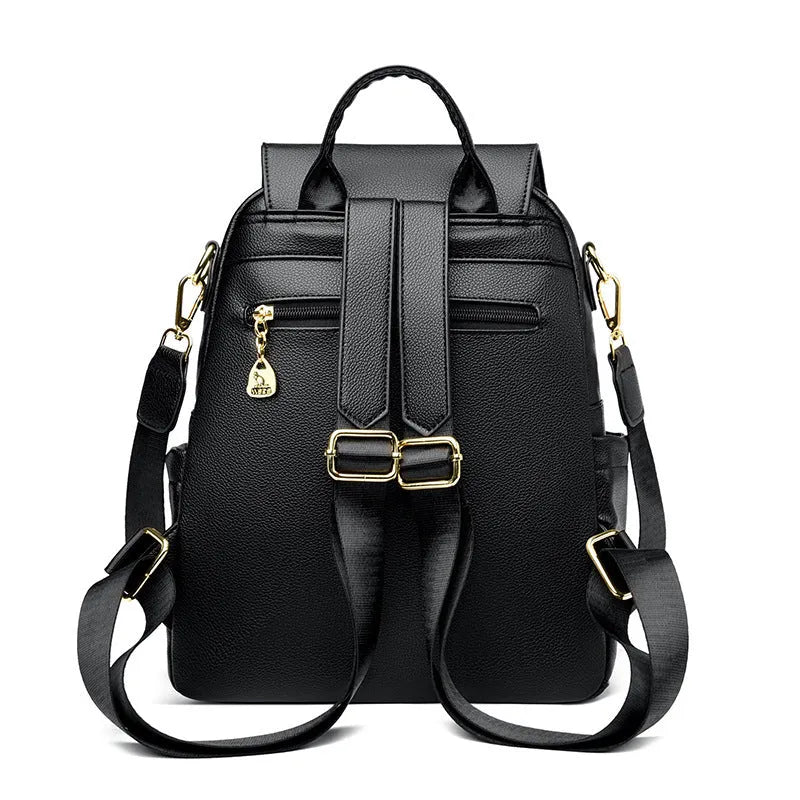 Genuine leather travel backpack with pendant in beige colour for female students, featuring belt decoration and splicing details