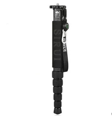 Black carbon fibre telescopic camera monopod extended to maximum height