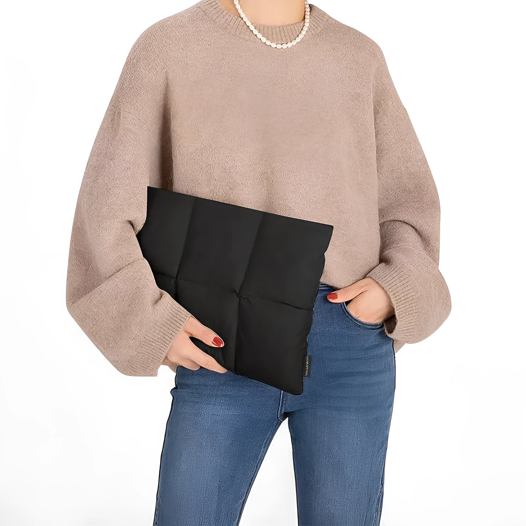 Soft fluffy laptop sleeve in black showing sewing thread details and open to reveal polyester lining