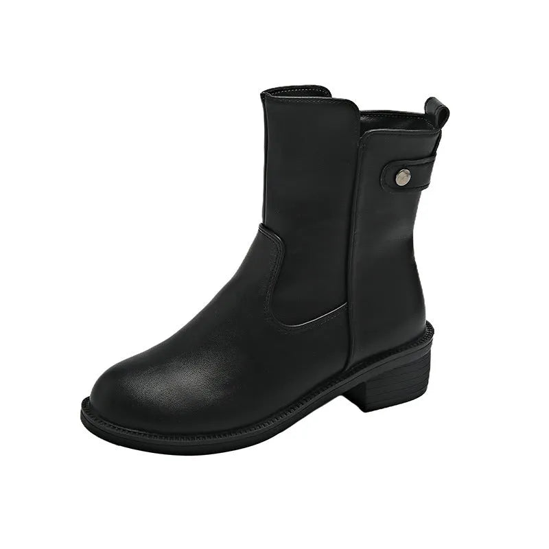 Black women's low heel ankle boots with side zip closure and round toe on a rubber sole.