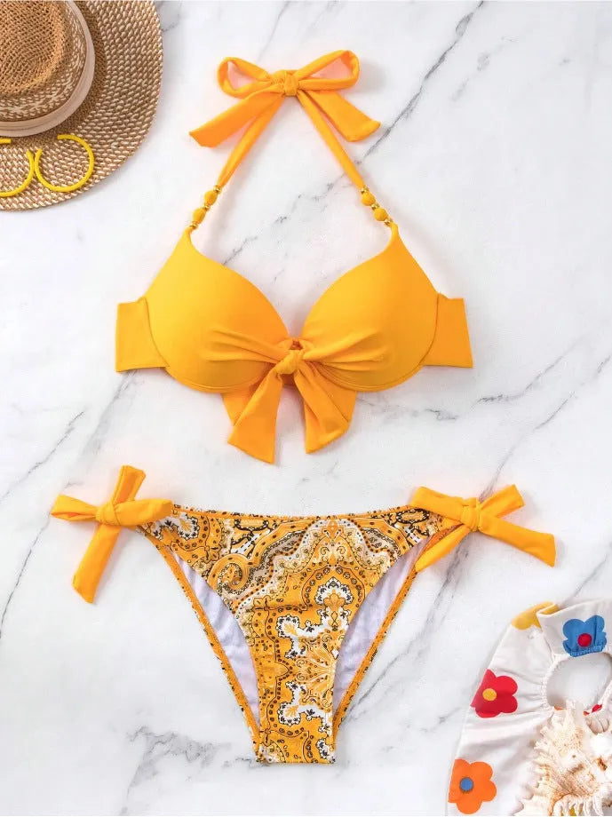 Ladies polyester bikini swimsuit in multiple colours including fluorescent green with sleeveless top and matching pants