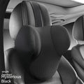 Black memory foam car headrest and lumbar support pillow set on a car seat