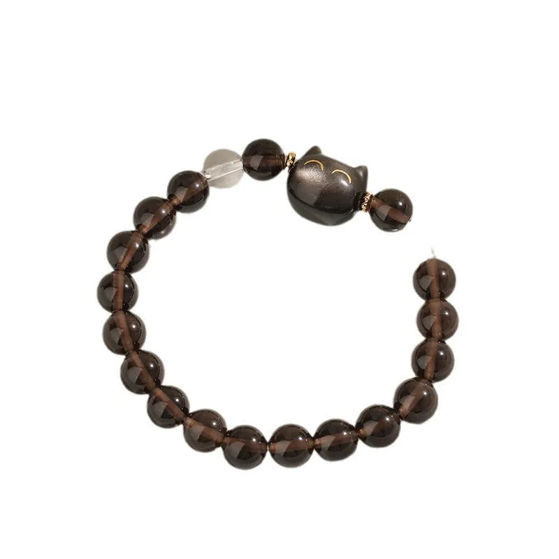 Women's silver tone bracelet with 8mm ice stone opal cat head charm and adjustable chain