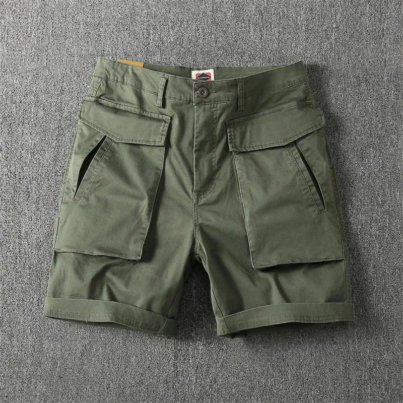 Men's straight-leg cargo shorts in army green with multiple button-closed pockets on thighs and sides.
