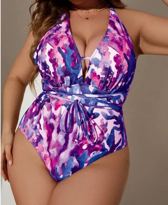 Women's solid blue one-piece halter neck swimsuit with briefs bottom on a mannequin