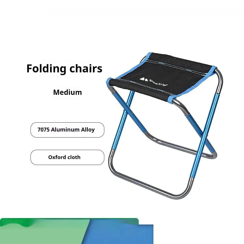 Black aluminium alloy folding stool in a portable design for outdoor camping and fishing.