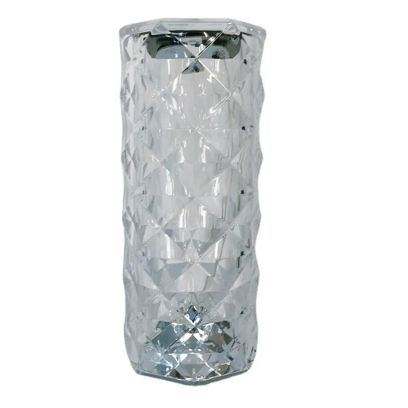 Creative crystal diamond table lamp with rechargeable RGB16 colour touch controls on a bedside table