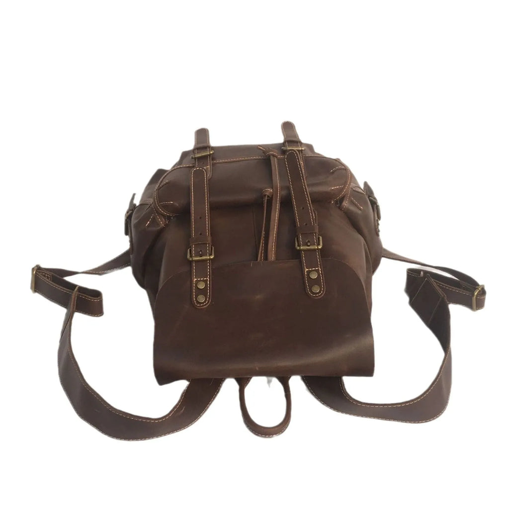 Brown men's leather backpack made from top-layer cowhide with an air pillow belt back system.