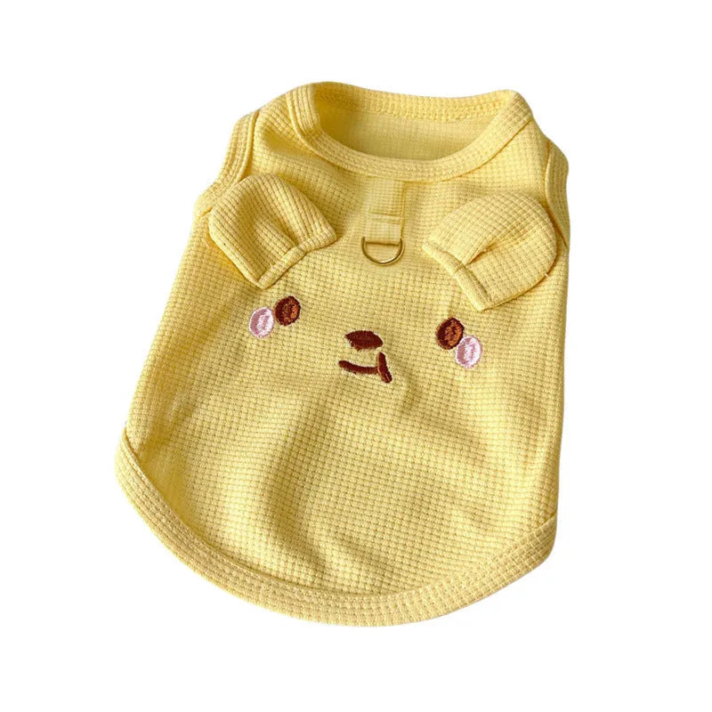 Yellow waffle-texture polyester vest for a small dog, showing sleeveless design and casual fit.