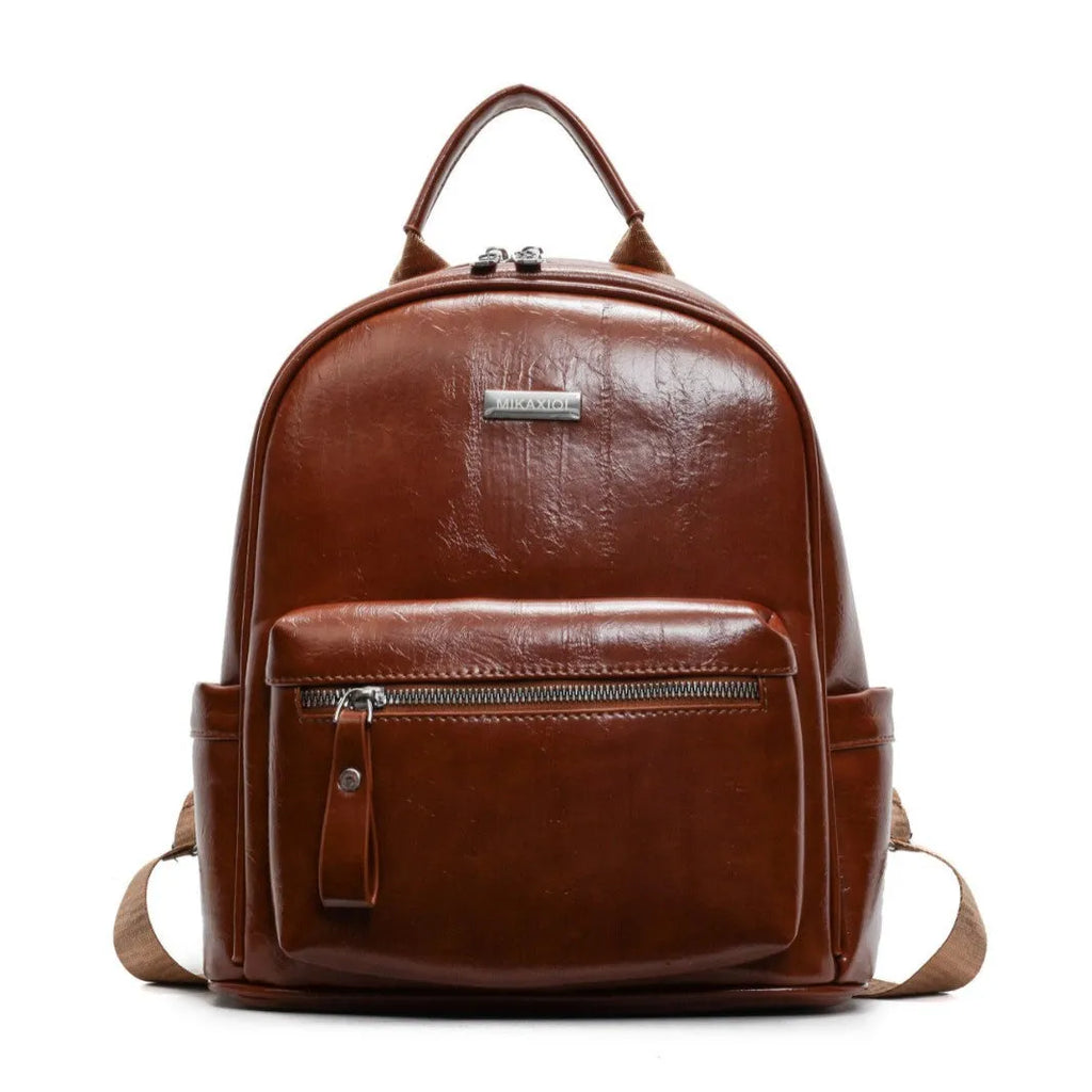 Simple fashion trendy ladies travel backpack in waterproof PU with sandwich pocket, available in multiple colours