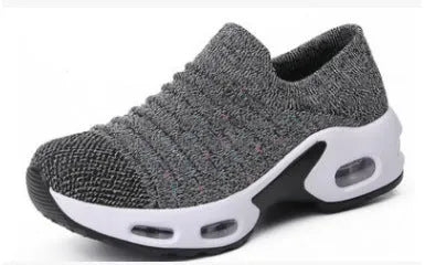 Plus size women's fly-knit socks shoes in light gray with mesh upper and low heel.