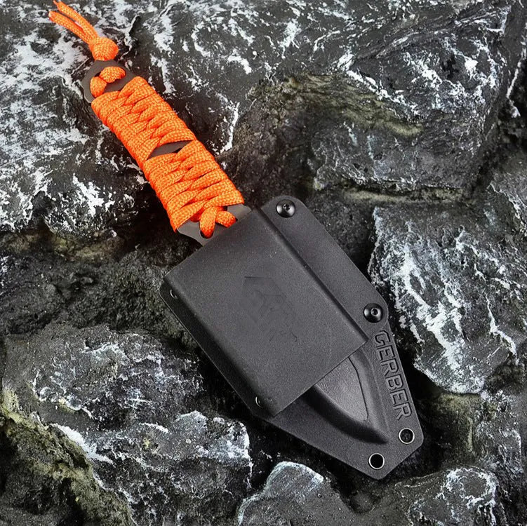 Outdoor camping survival knife with straight blade, rope handle, and ABS protective sheath