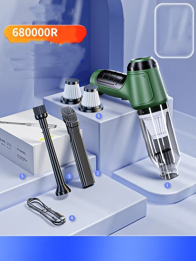 Green handheld cordless vacuum cleaner for car interiors with suction nozzle attached.