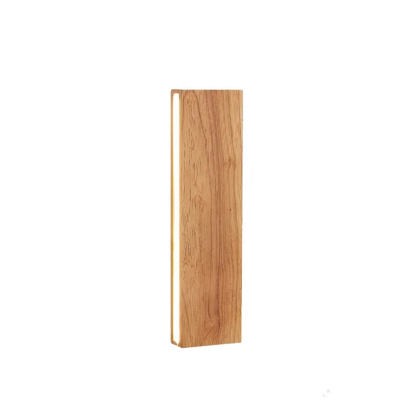Solid wood Nordic Japanese style LED wall lamp with warm light, 32cm size, mounted above a wooden bedside table