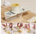 Three-in-one stainless steel ginger and garlic grinder with potato slicer, beige or green handle