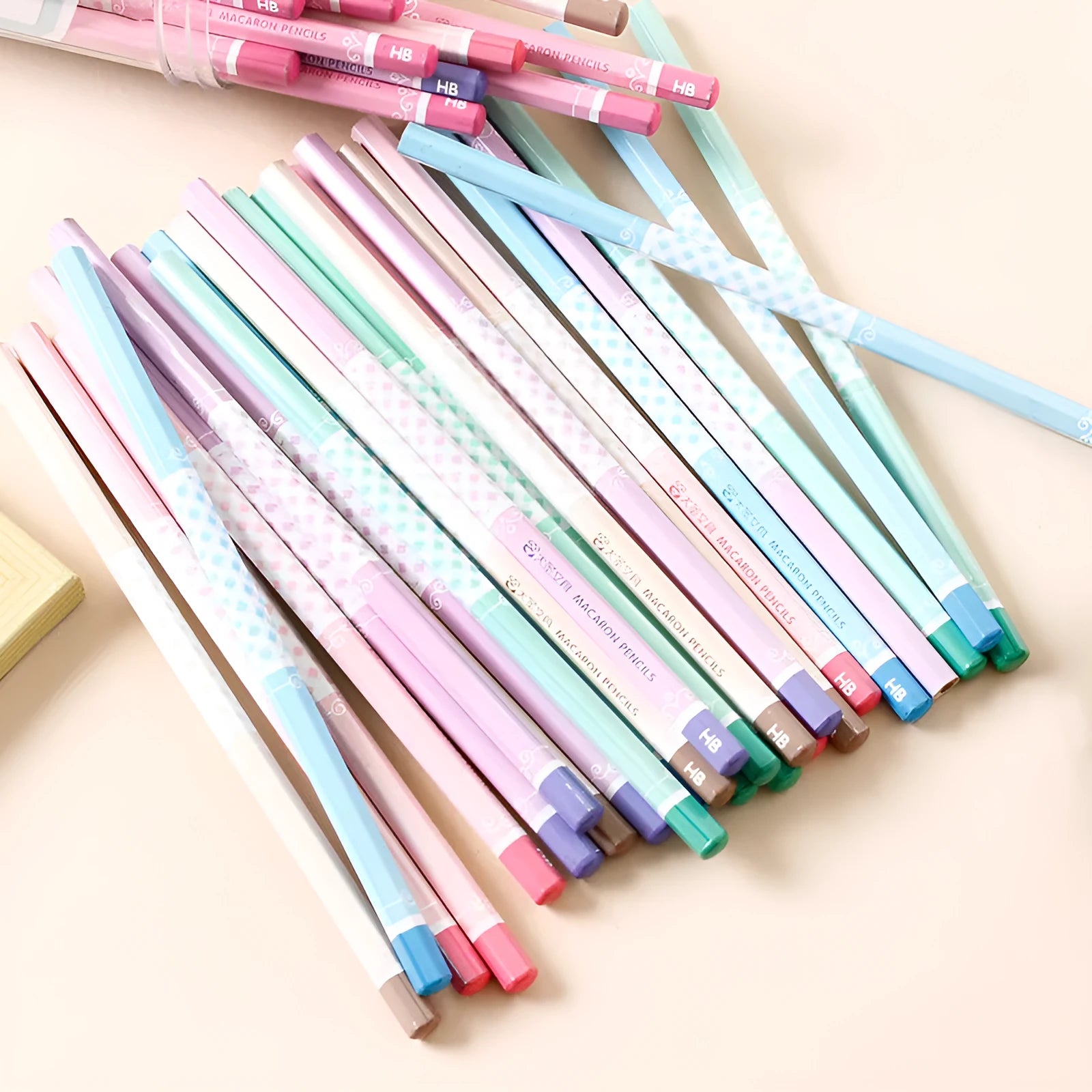 Barrel of 50 basswood hexagonal pencils with HB graphite refills, showing six-angle design.