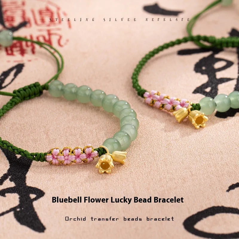 Hand woven red rope bracelet for women with lily carrying strap design and flower pattern