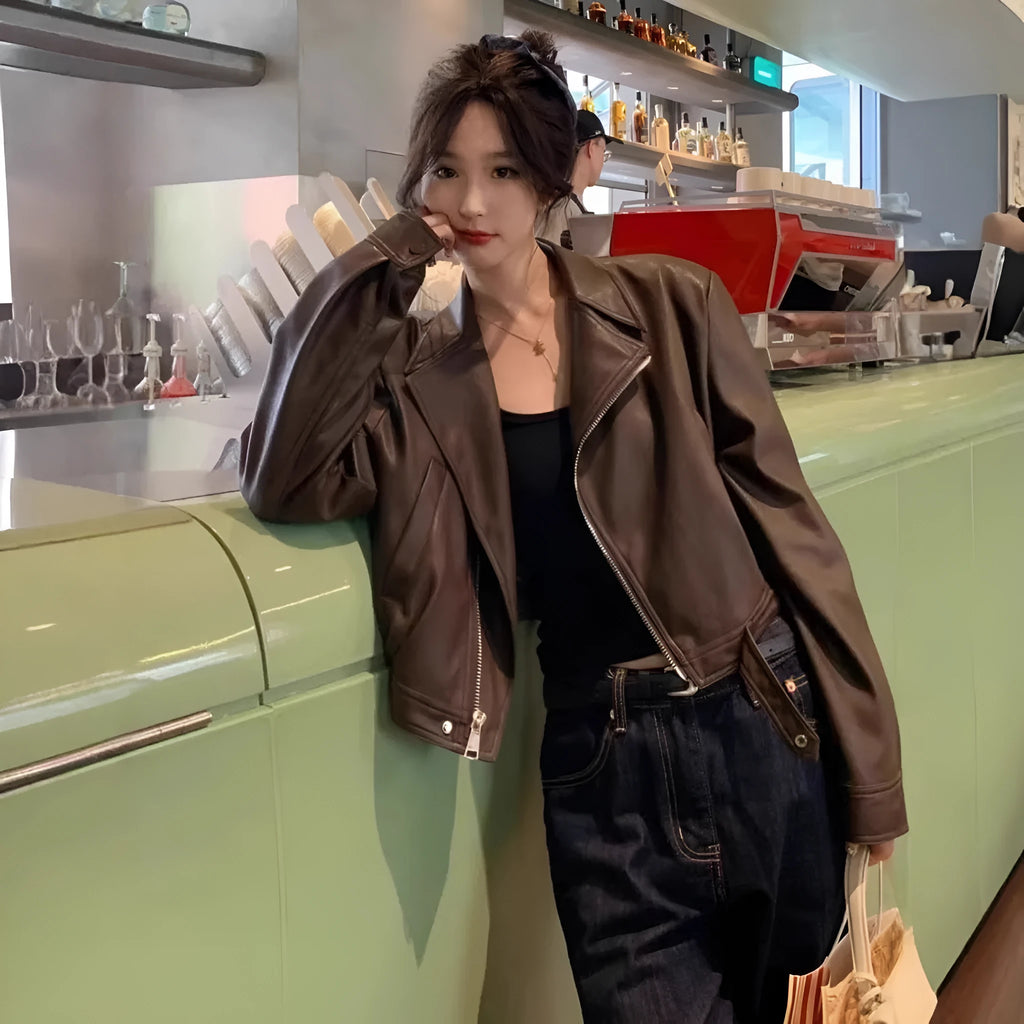Brown women's retro slim fit leather-look jacket with pockets, short 40cm length.