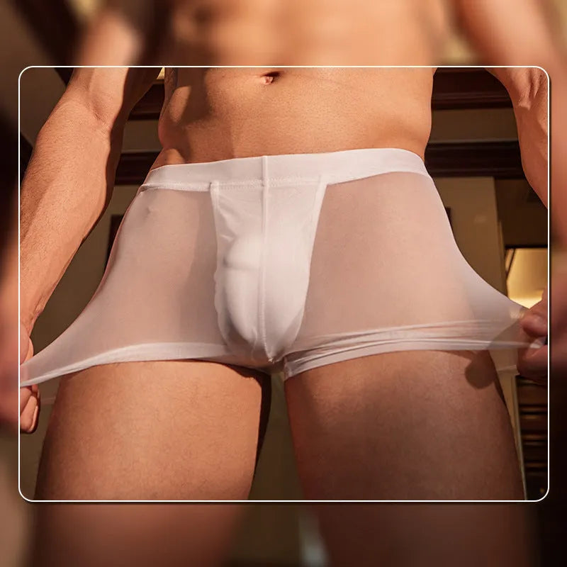 Men's black ultra-thin nylon boxer briefs laid flat, showing free size fit.