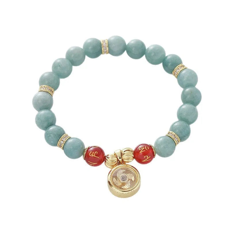 Natural agate bracelet with geometric jade-toned beads and lotus seedpod design