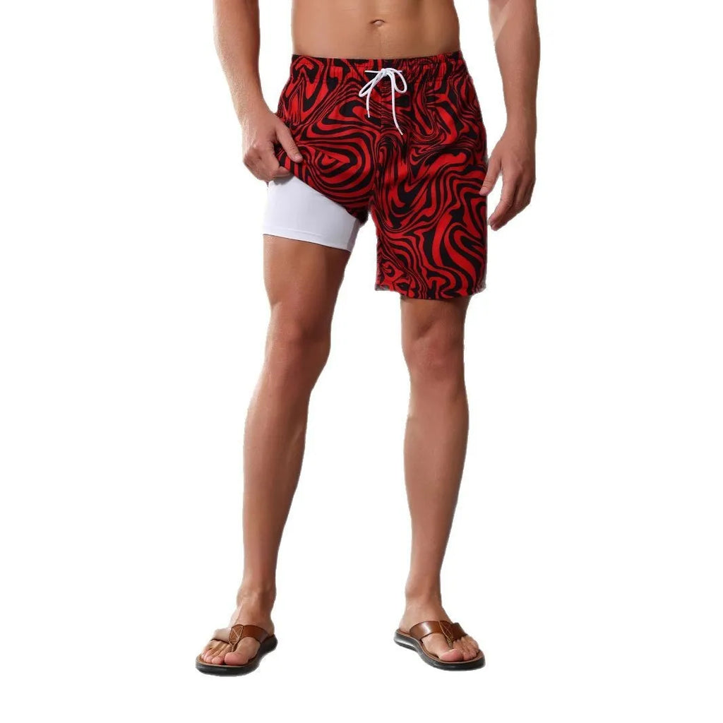 European size quick-drying stretch beach shorts with liner in a camouflage print.