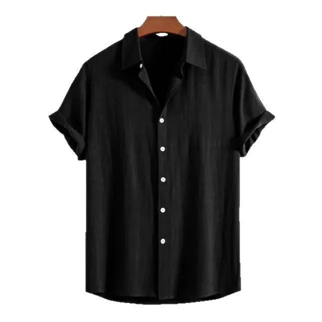A man's loose-fit, short-sleeve cardigan in a solid colour, shown in black, green, or white.
