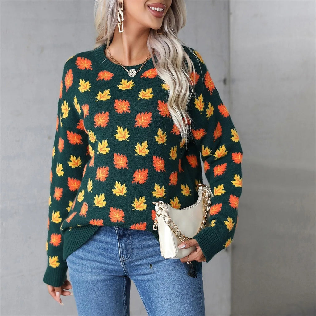 Women's maple leaf Christmas sweater in loose fit with contrast colour design, available in beige or dark green