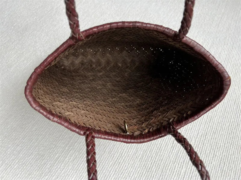 Brown handmade woven tote bag made of genuine cowhide leather with a three-dimensional pocket.