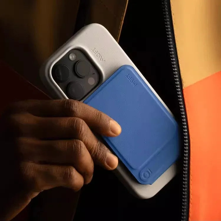 Magnetic mobile phone holder case in MOVAS leather shown in black, blue, green, and grey colour options.
