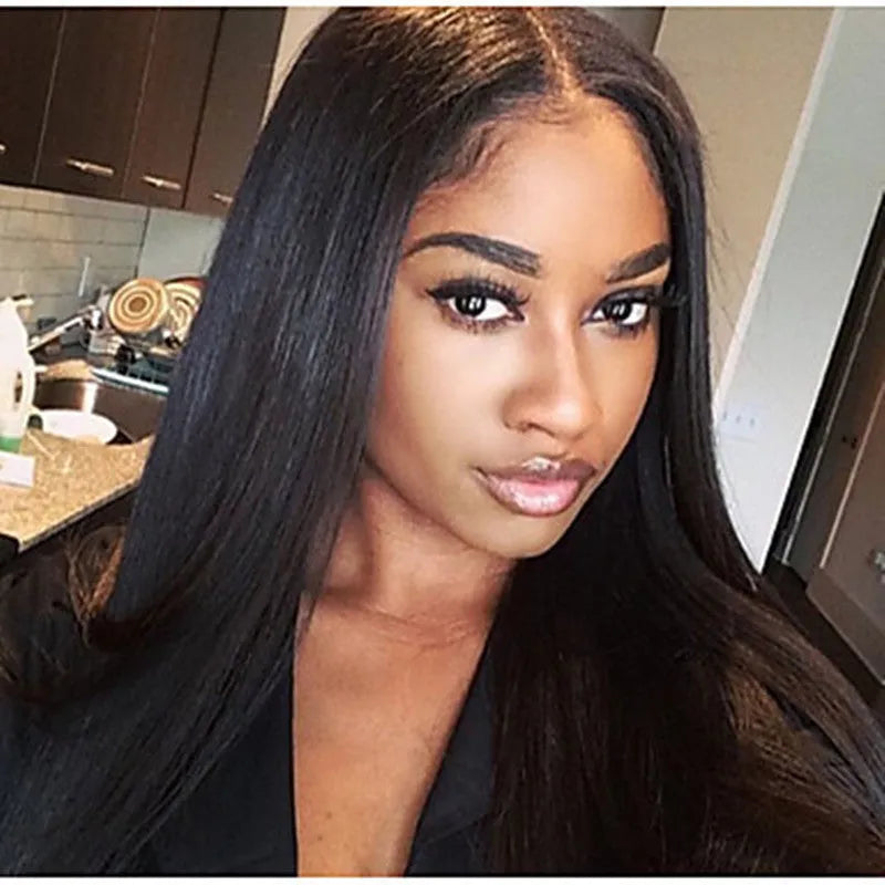 A long straight black synthetic wig with centre-parted bangs, made from high-temperature fibre.