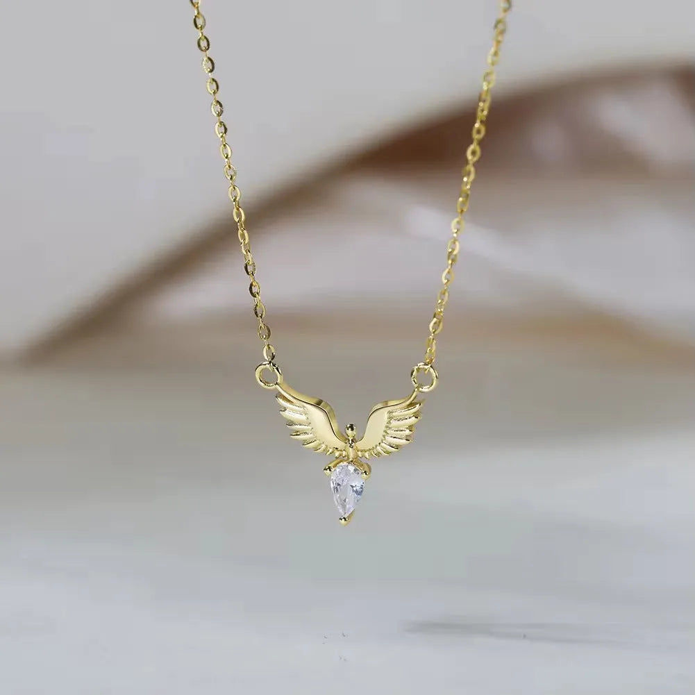 Women's sterling silver eagle pendant necklace on an adjustable O-ring chain in white gold colour.