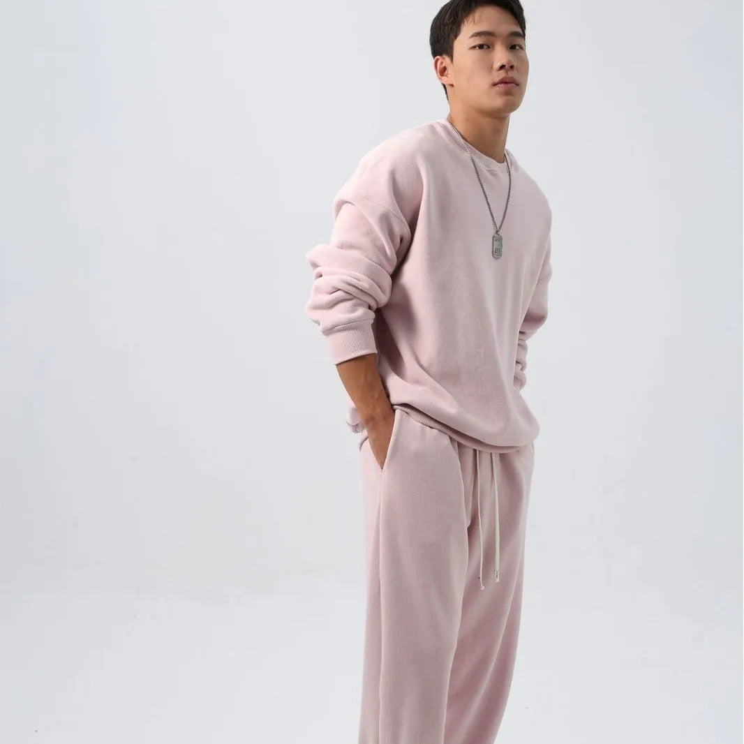 Men's polar fleece winter sports suit two-piece set showing padded jacket and matching trousers