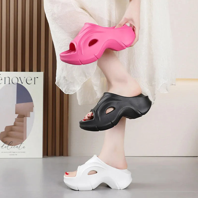 Women's thick-soled EVA slippers in white, black, or rose red colours with rounded toe design