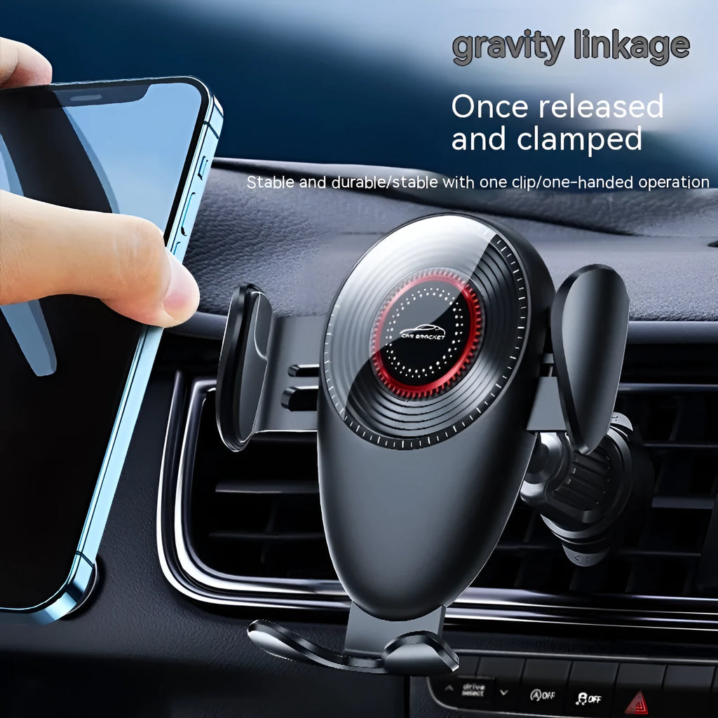 Black universal car mobile phone bracket attached to a car air vent