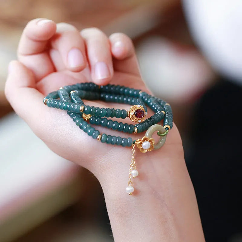 Blue water jade abacus bead and tourmaline ring bracelet with pearls under 4mm.